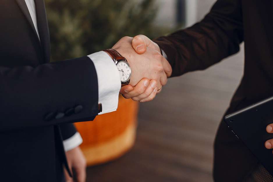 corporate business partnership handshake